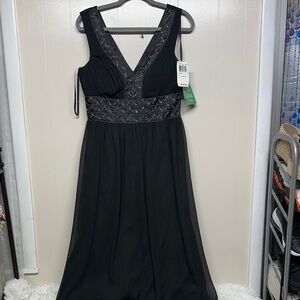 Elegant Black Maxi Dress with Embellished V-Neck